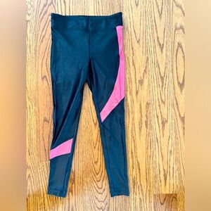 Women's Koral leggings, size medium. Black and coral in color.